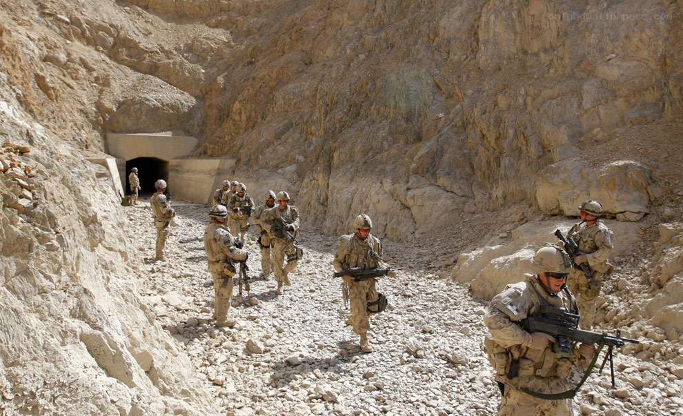 Soldiers in a rocky canyon