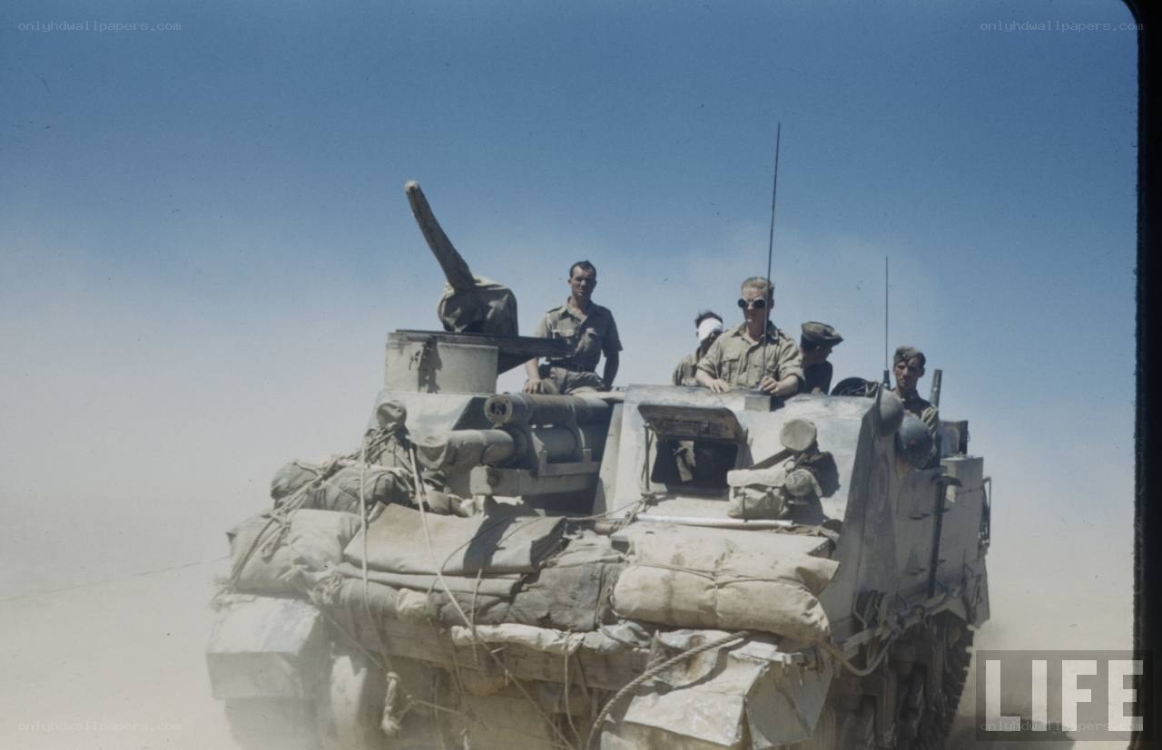 Soldiers in a tank during war
