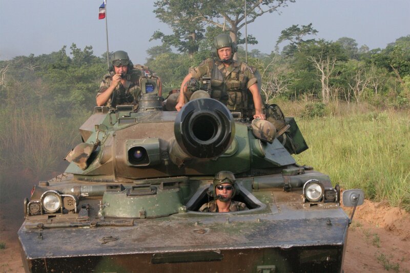 Soldiers in a tank in the jungle