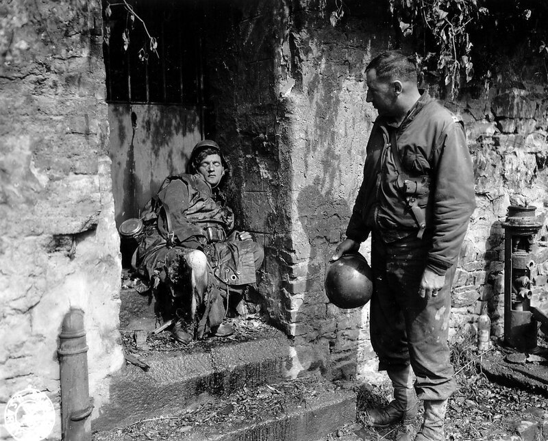 Soldiers in a war-torn alley