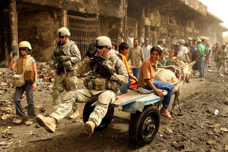 Soldiers in a war-torn city