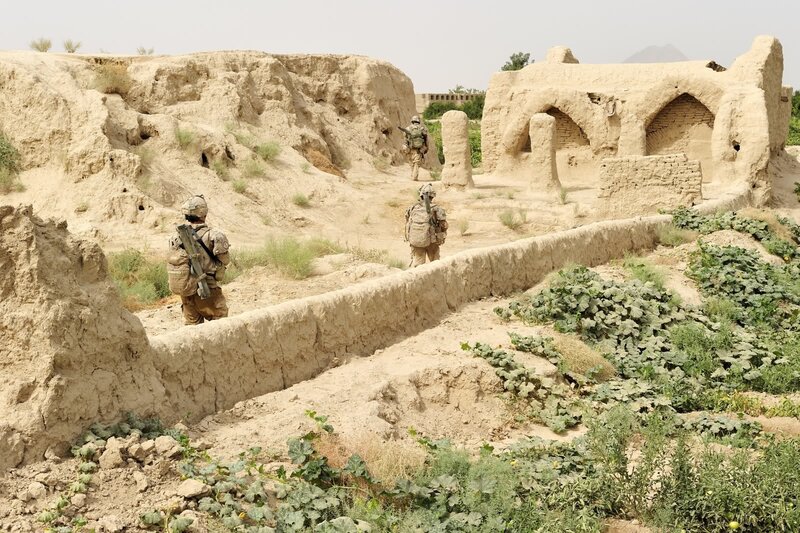 Soldiers in ancient ruins