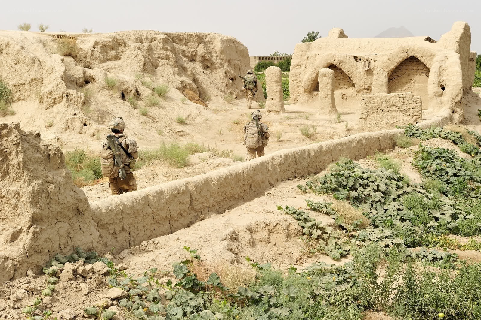 Soldiers in ancient ruins