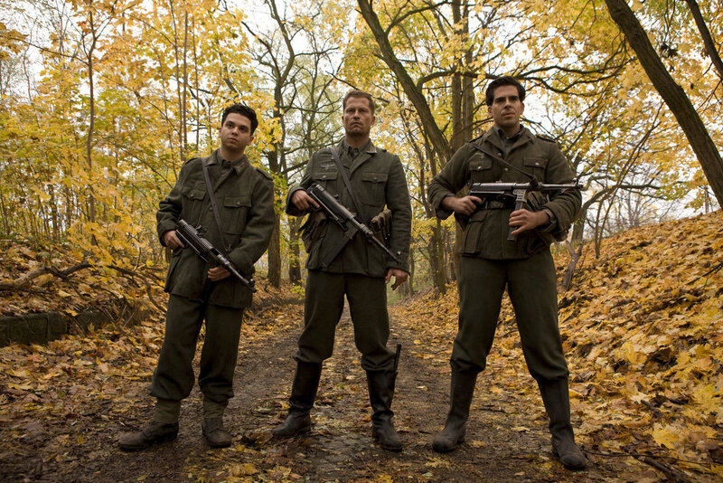 Soldiers in autumn forest