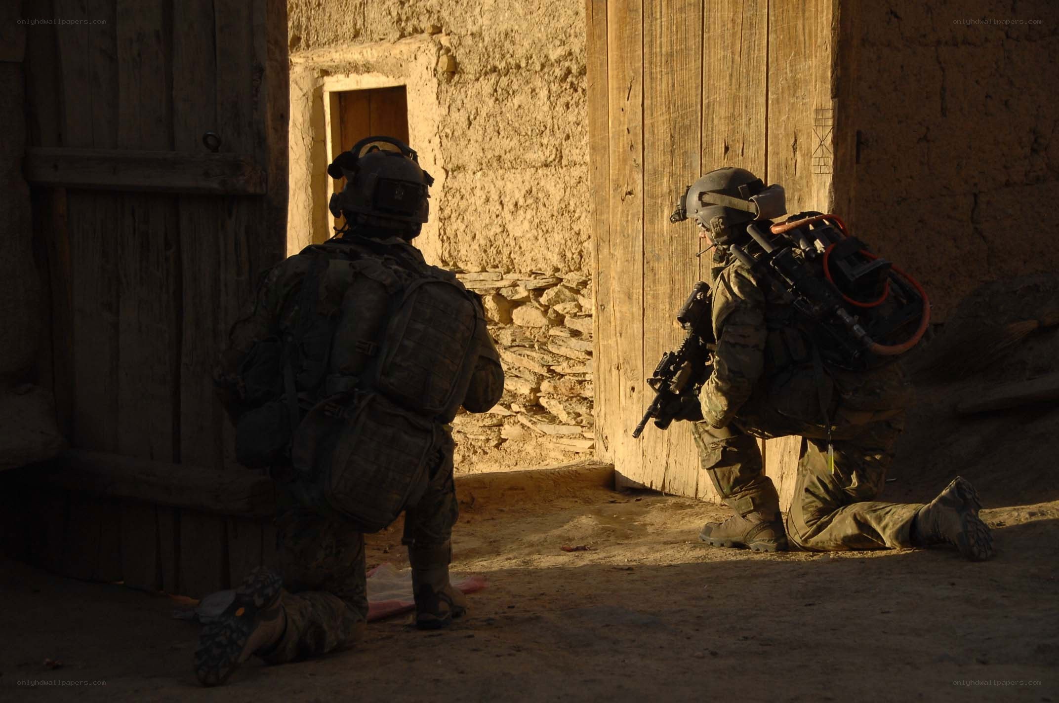Soldiers in combat gear