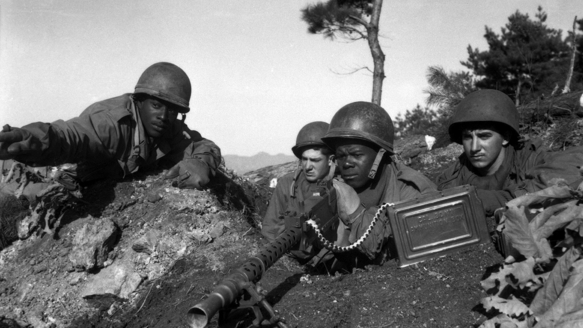 Soldiers in combat trench