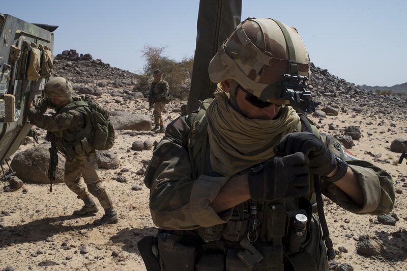 Soldiers in desert terrain