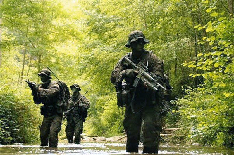 Soldiers in Forest Stream