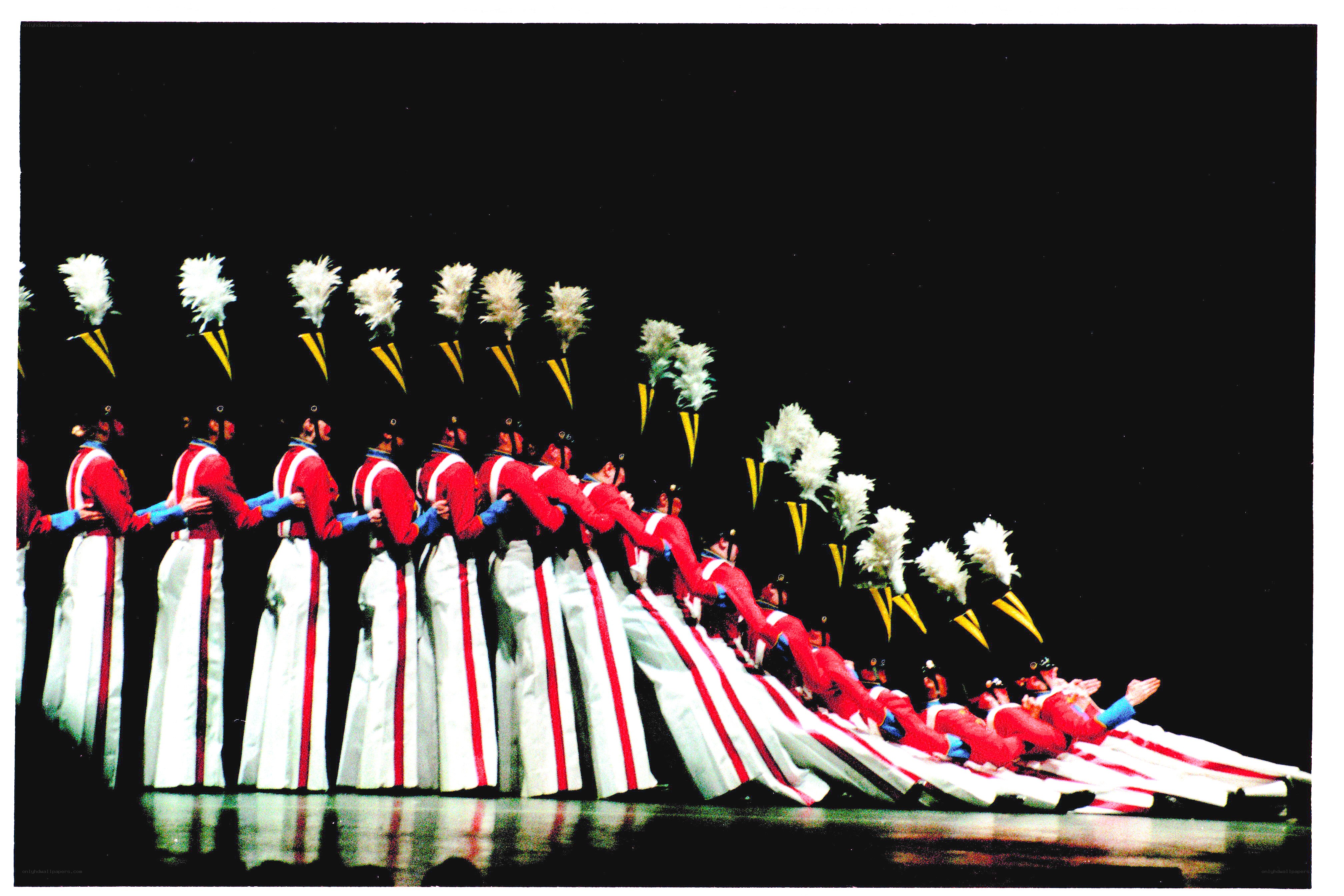 Soldiers in formation on stage