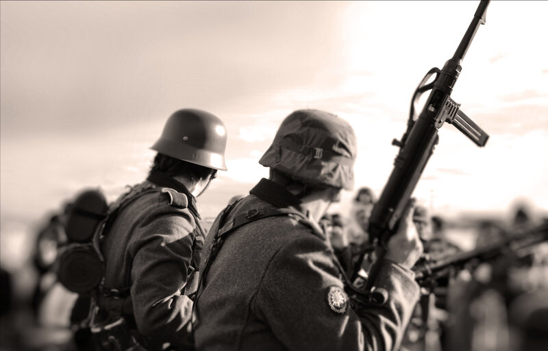Soldiers in formation with rifles