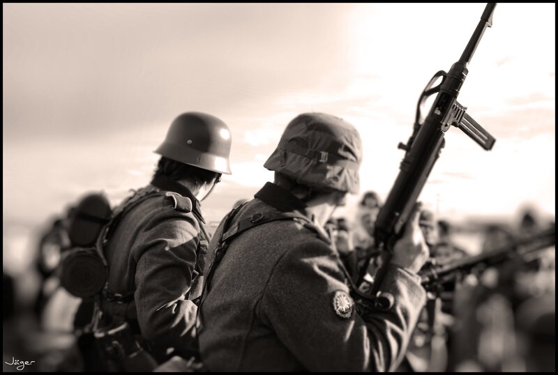 Soldiers in formation with rifles