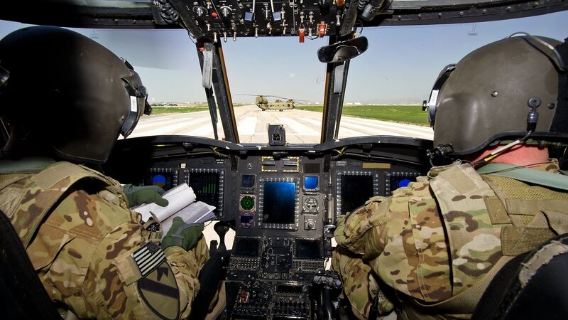 Soldiers in Helicopter Cockpit — Green