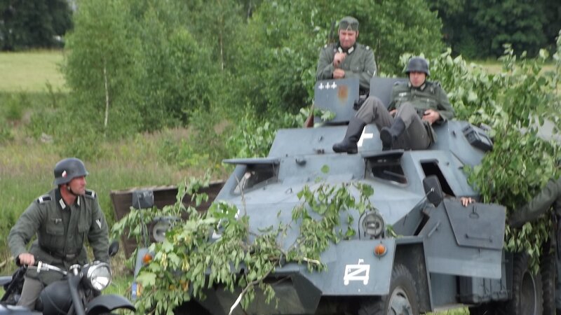 Soldiers in military vehicle