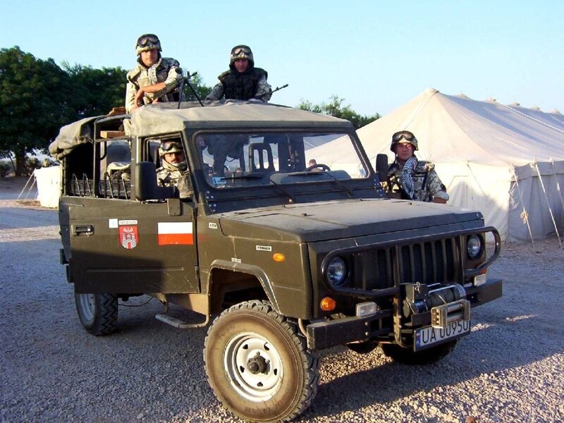 Soldiers in Military Vehicle — Green, Serious, Afternoon