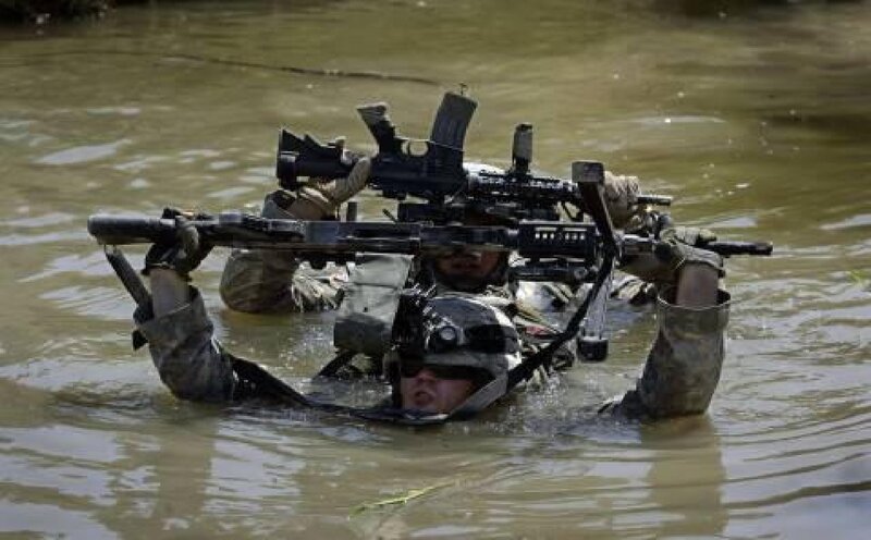 Soldiers in Muddy Water — Brown