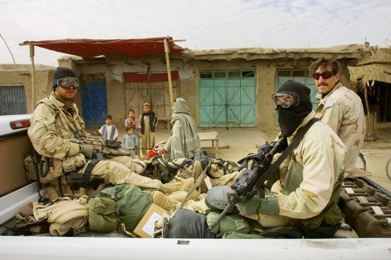 Soldiers in pickup truck