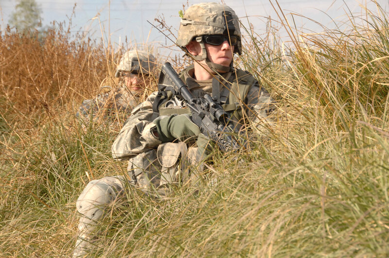 Soldiers in Tall Grass