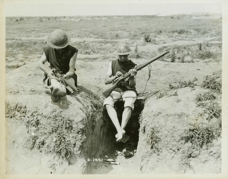 Soldiers in Trench — Black, Serious, Afternoon, Photograph