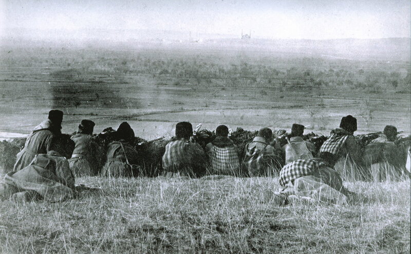Soldiers in trench during war