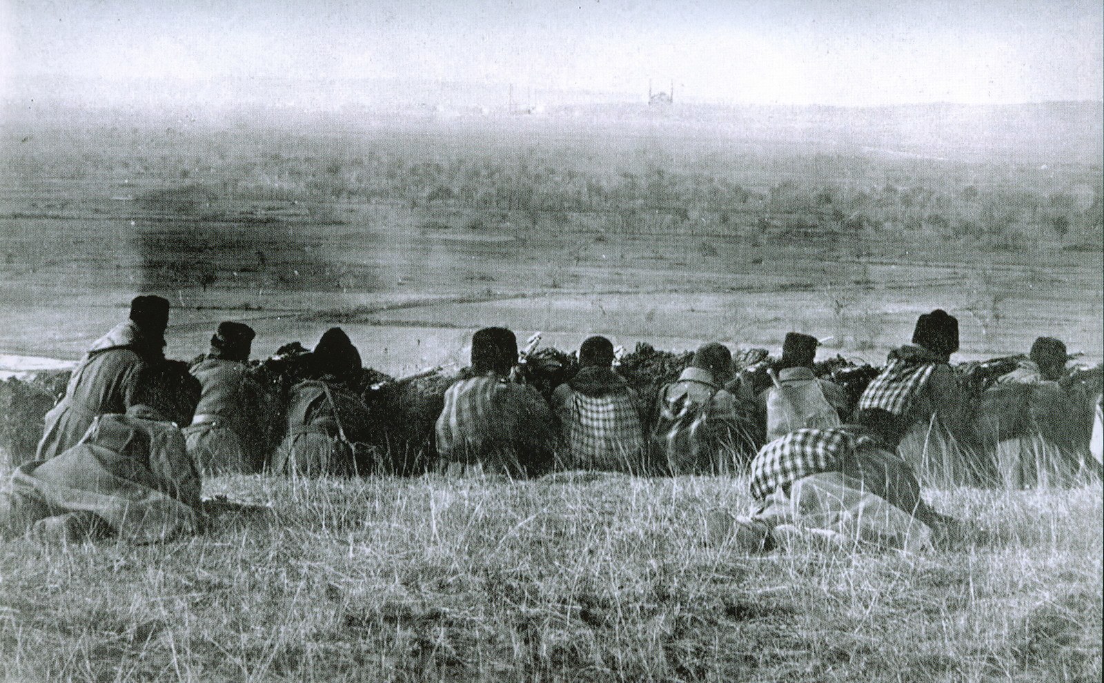 Soldiers in trench during war
