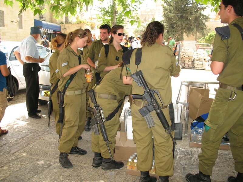 Soldiers in uniform at a checkpoint