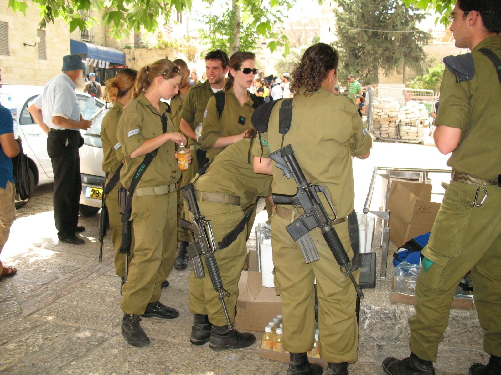 Soldiers in uniform at a checkpoint
