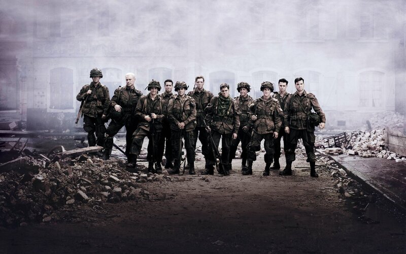 soldiers in war-torn street