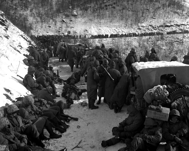 Soldiers in winter trench