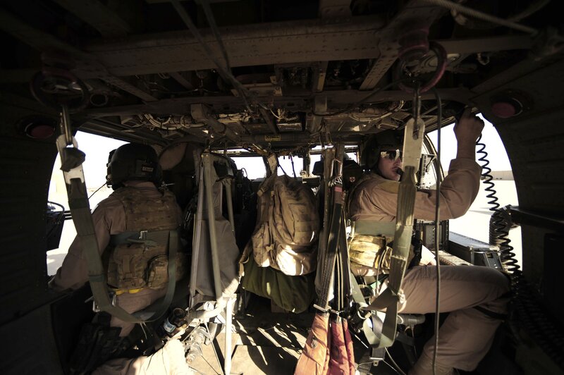 Soldiers inside a military helicopter