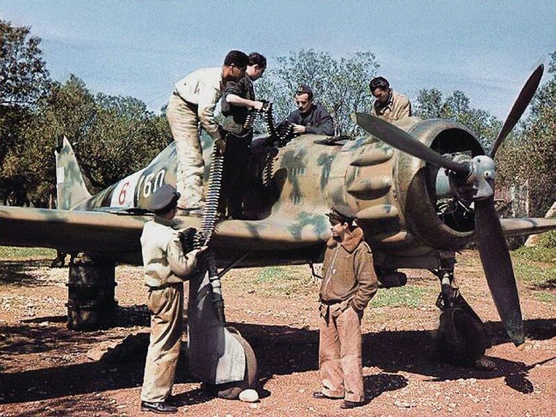 Soldiers loading aircraft ammunition