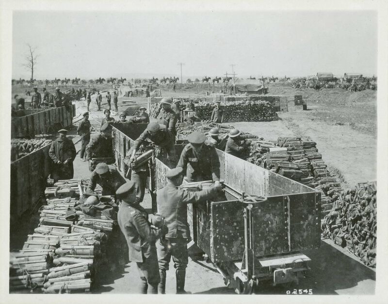 Soldiers loading supplies on train