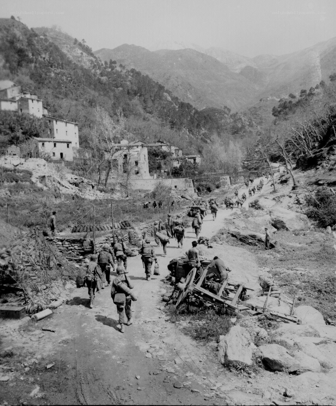 Soldiers marching in a mountain valley