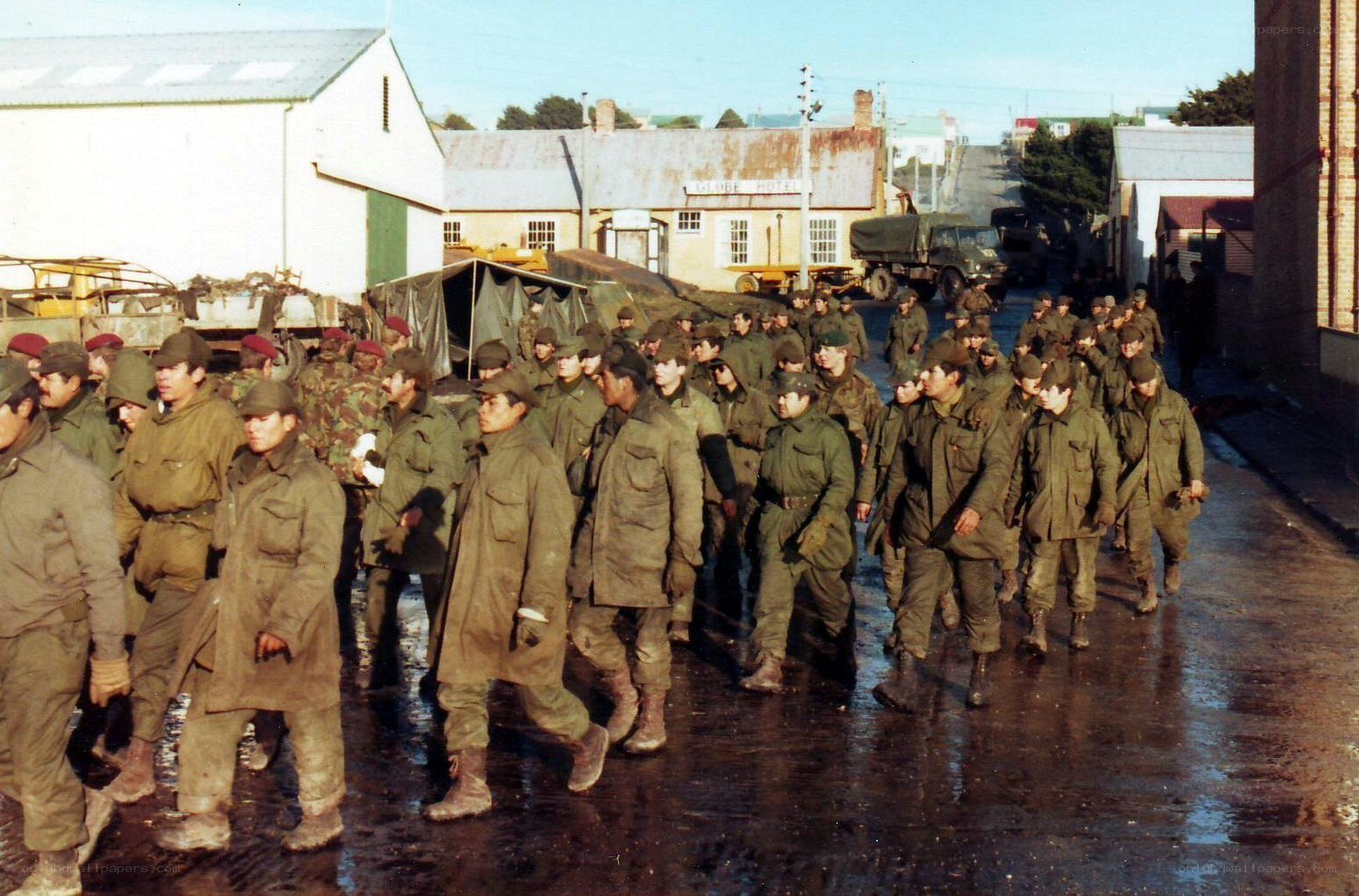 Soldiers marching in a town