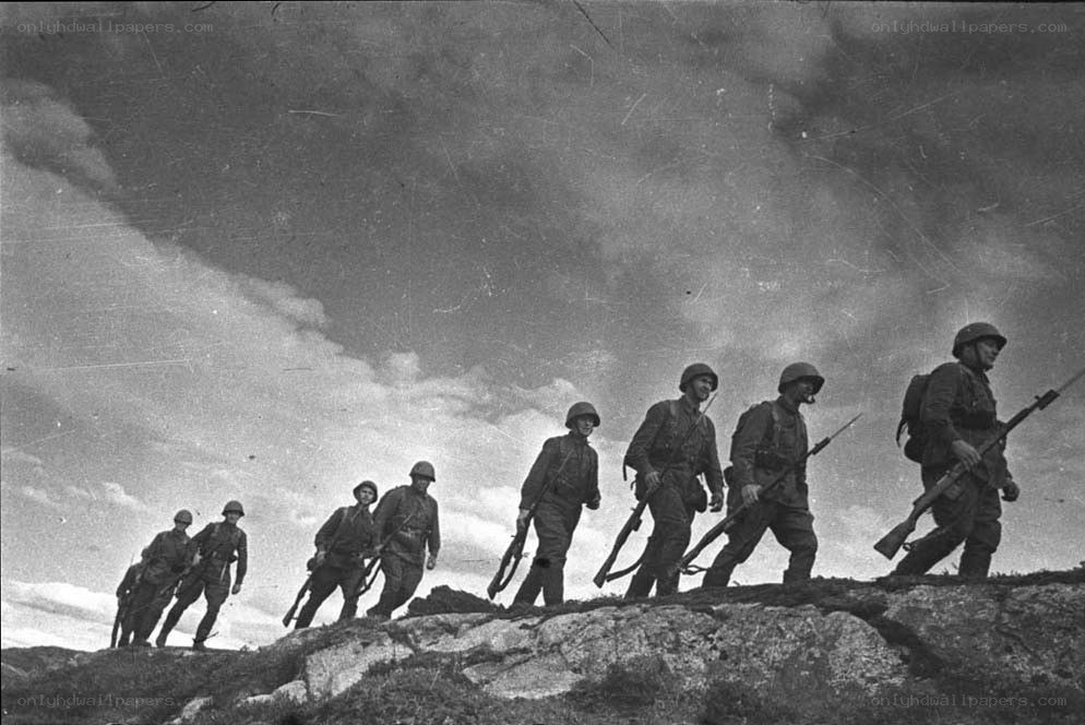 Soldiers marching on a hill