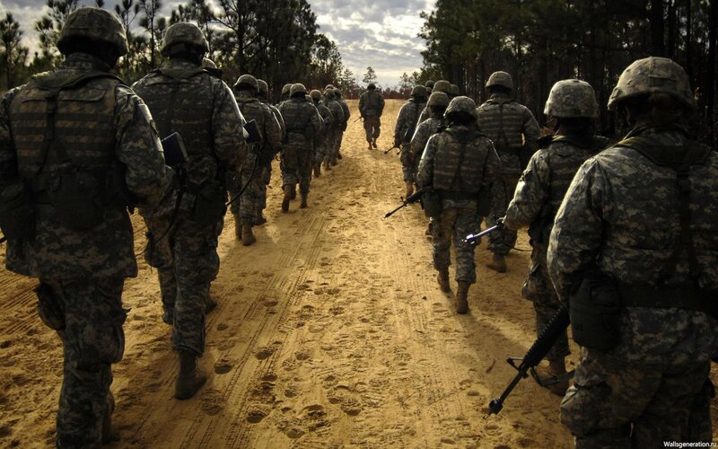 Soldiers Marching on Dirt Road — Green, Serious