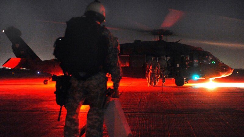 Soldiers Near Helicopter — Red