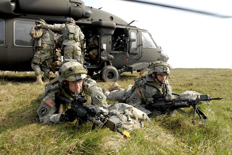 Soldiers near helicopter