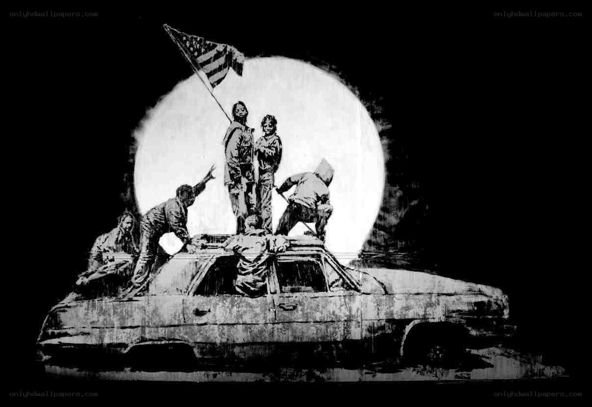 Soldiers on a car with flag