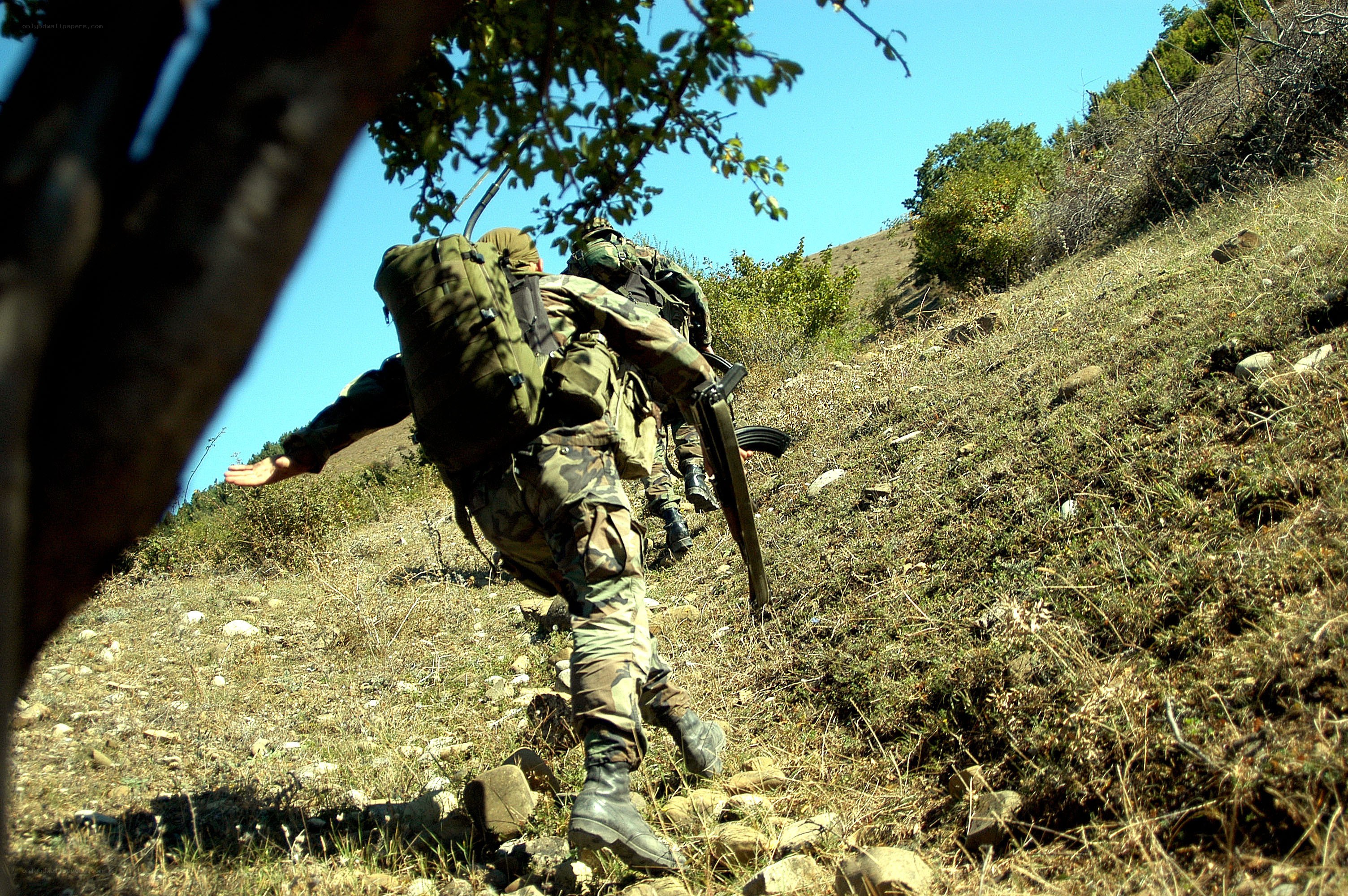 Soldiers on a hillside