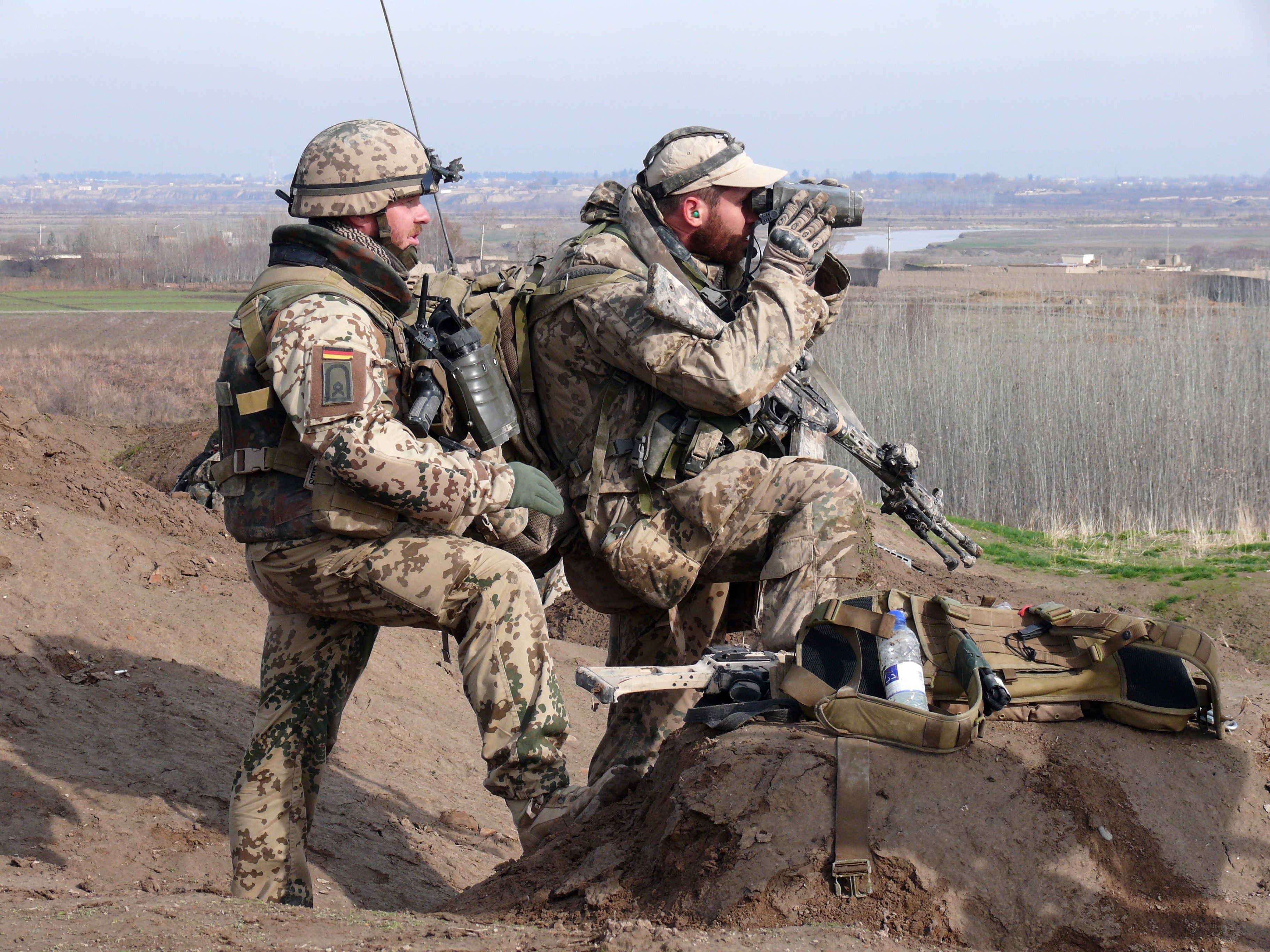 Soldiers on a hilltop observation