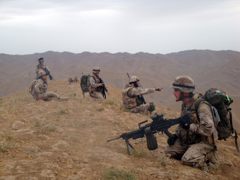 Soldiers on a hilltop patrol