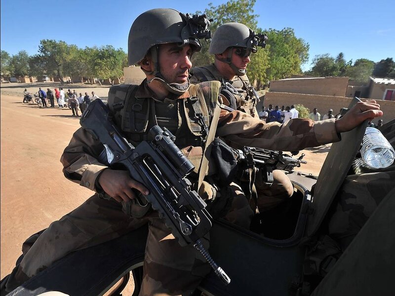 Soldiers on a military vehicle