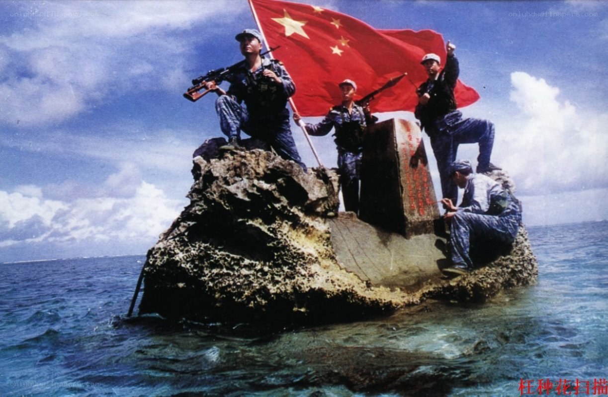 Soldiers on a reef with Chinese flag