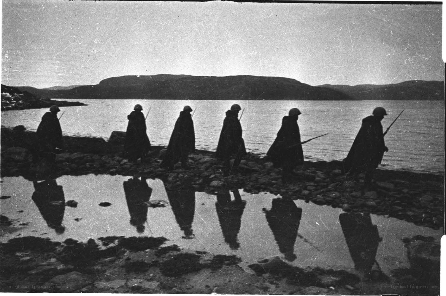Soldiers on a shoreline