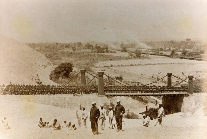 Soldiers on a suspension bridge