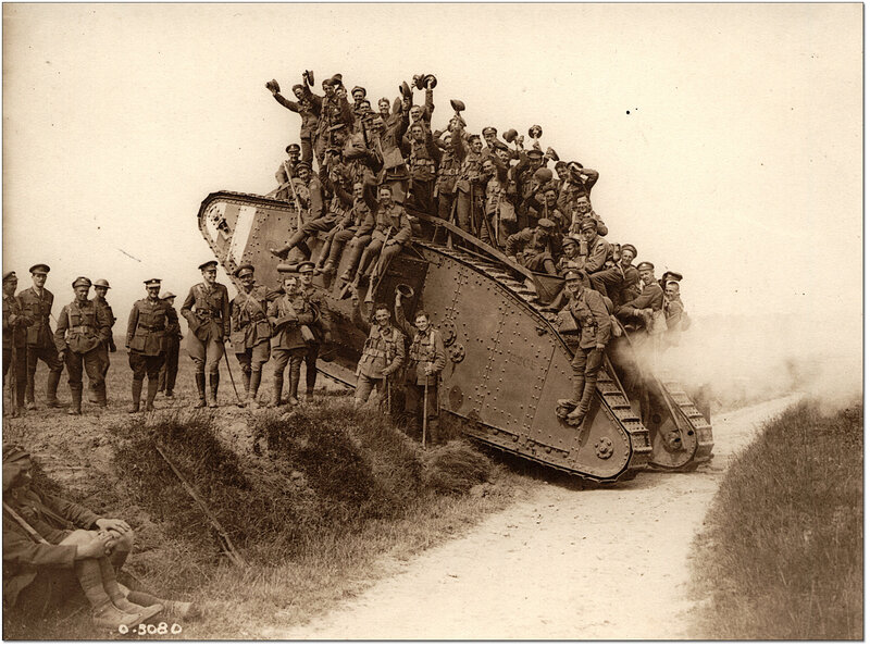 Soldiers on a tank after battle