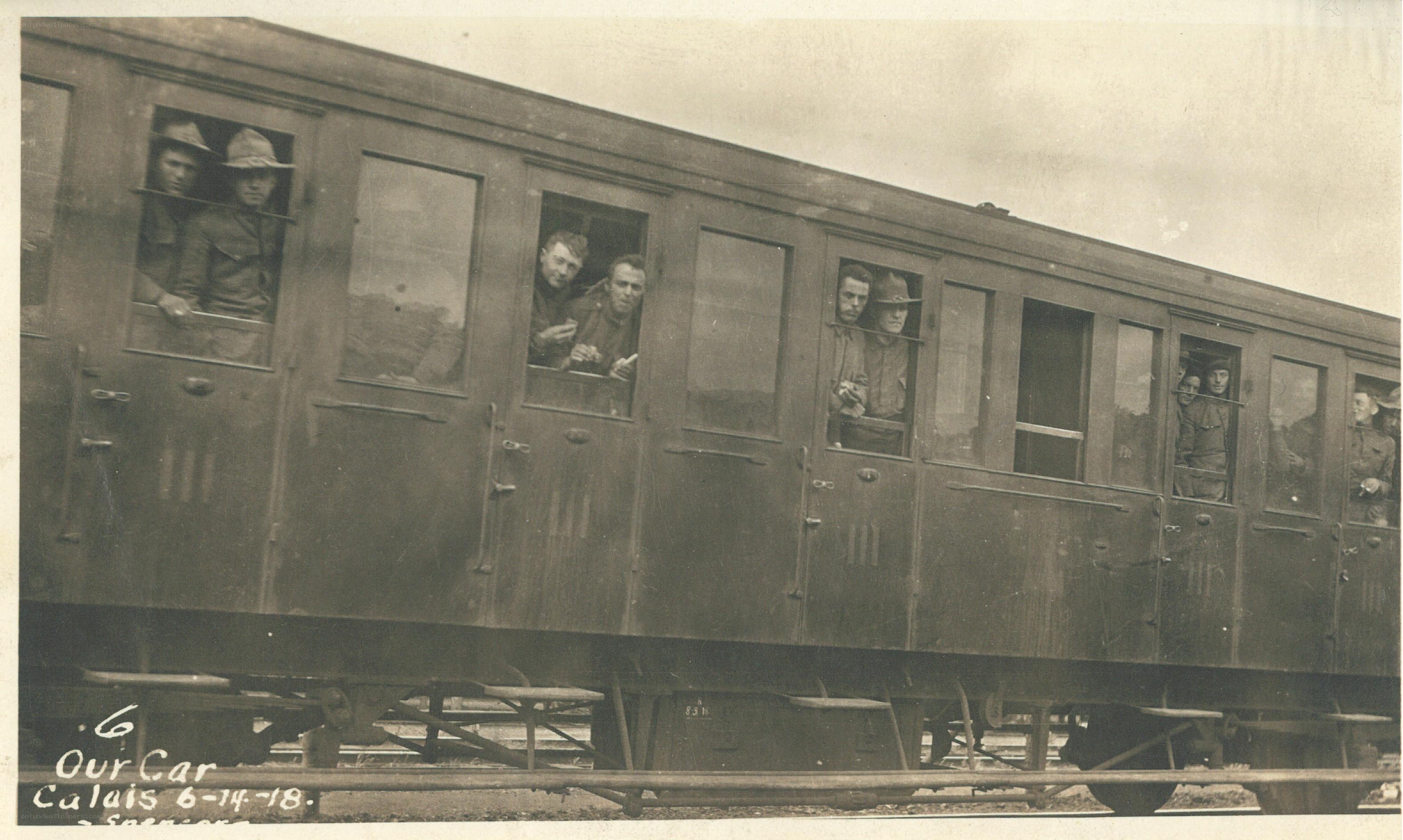 Soldiers on a train car