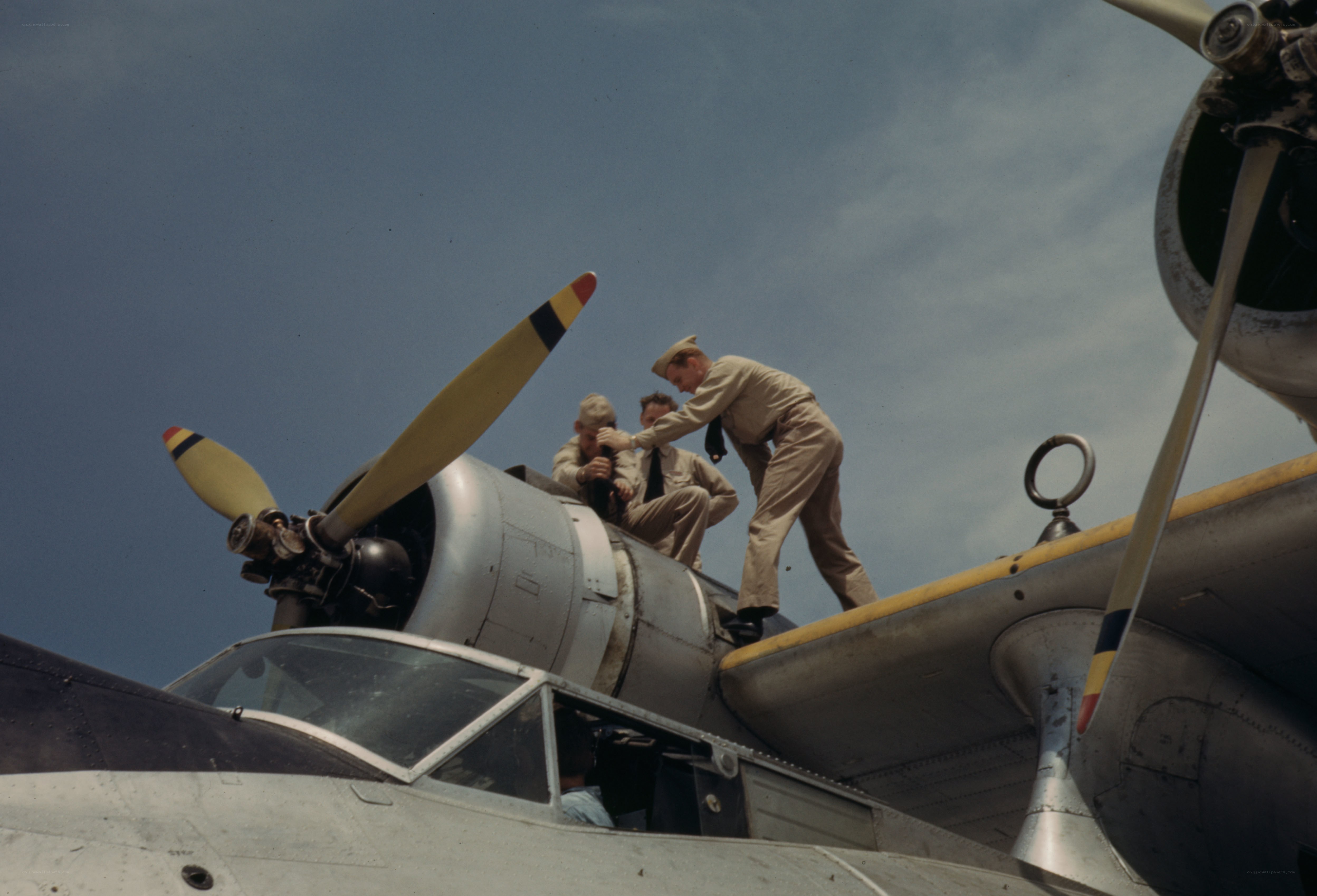 Soldiers on aircraft engine