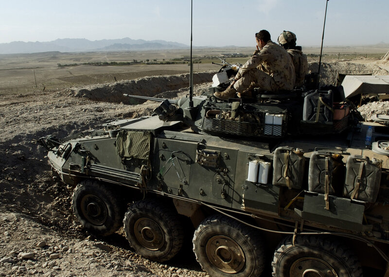 Soldiers on armored vehicle
