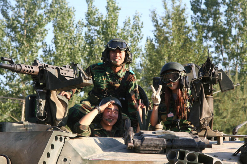 Soldiers on armored vehicle